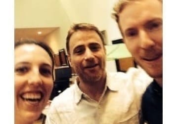 A photo of Ali Rayl, Stewart Butterfield, and Johnny Rodgers